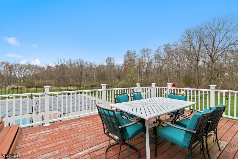 30 Lanning Road Blairstown, NJ 07825 - Photo 31 of 40 a view of a chairs and table on the deck