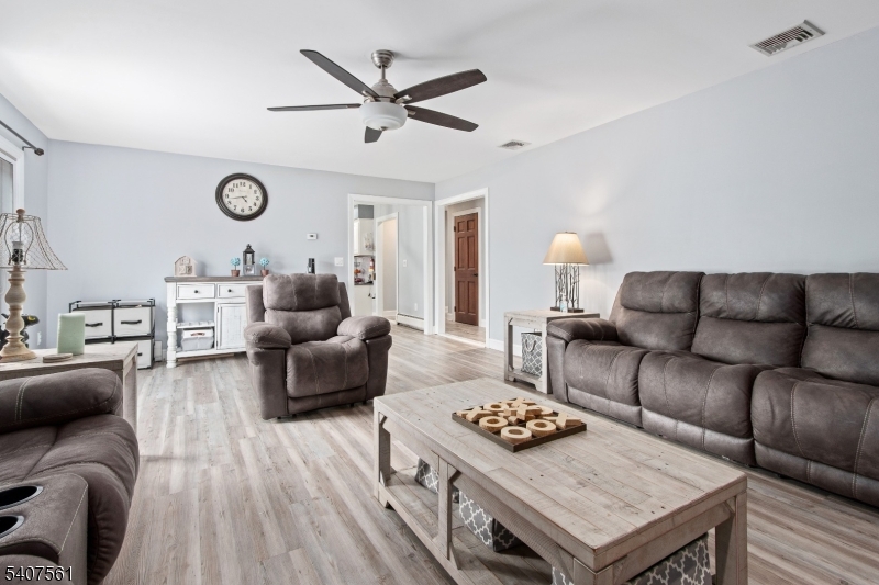 30 Lanning Road Blairstown, NJ 07825 - Photo 7 of 40 a living room with furniture and a wooden floor