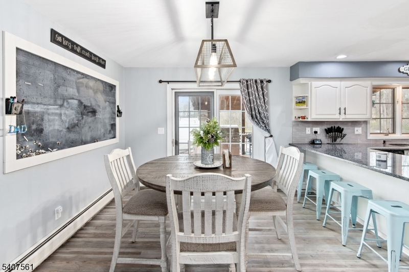 30 Lanning Road Blairstown, NJ 07825 - Photo 9 of 40 a view of a dining room with furniture window and wooden floor