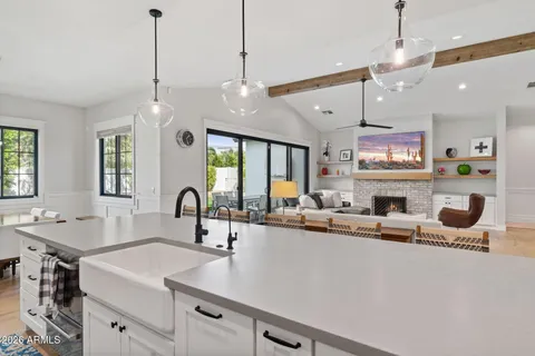 a view of storage and utility room with two washing machine