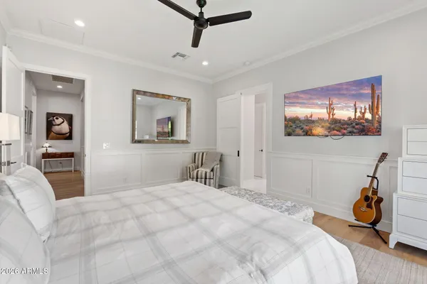 a bathroom with a double vanity sink mirror and