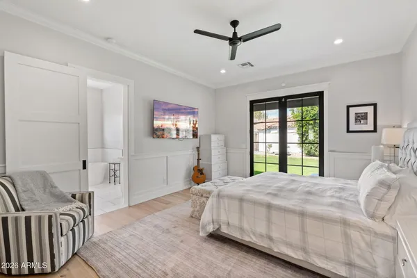 a white bath tub sitting next to a window