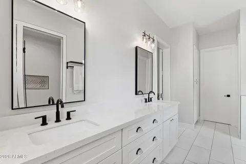 a bedroom with bed and a window