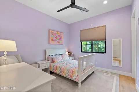 a living room with furniture and windows