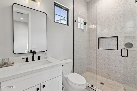 a view of a patio with table and chairs