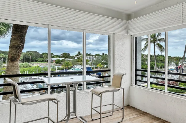 an aerial view of house with yard swimming pool and outdoor seating