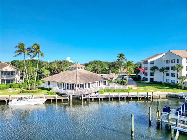 a kitchen with stainless steel appliances a refrigerator and a stove top oven
