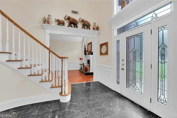 a view of entryway and workspace