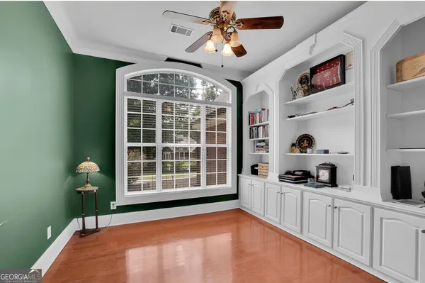 a view of a kitchen with a sink and a window