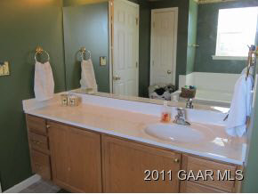 2544 North River Road Bridgewater, VA 22812 - Photo 11 of 20 a bathroom with a sink and a mirror