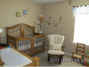 2544 North River Road Bridgewater, VA 22812 - Photo 13 of 20 a view of a hallway with wooden floor and a potted plant