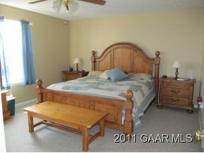 2544 North River Road Bridgewater, VA 22812 - Photo 8 of 20 a bedroom with a bed and a dresser