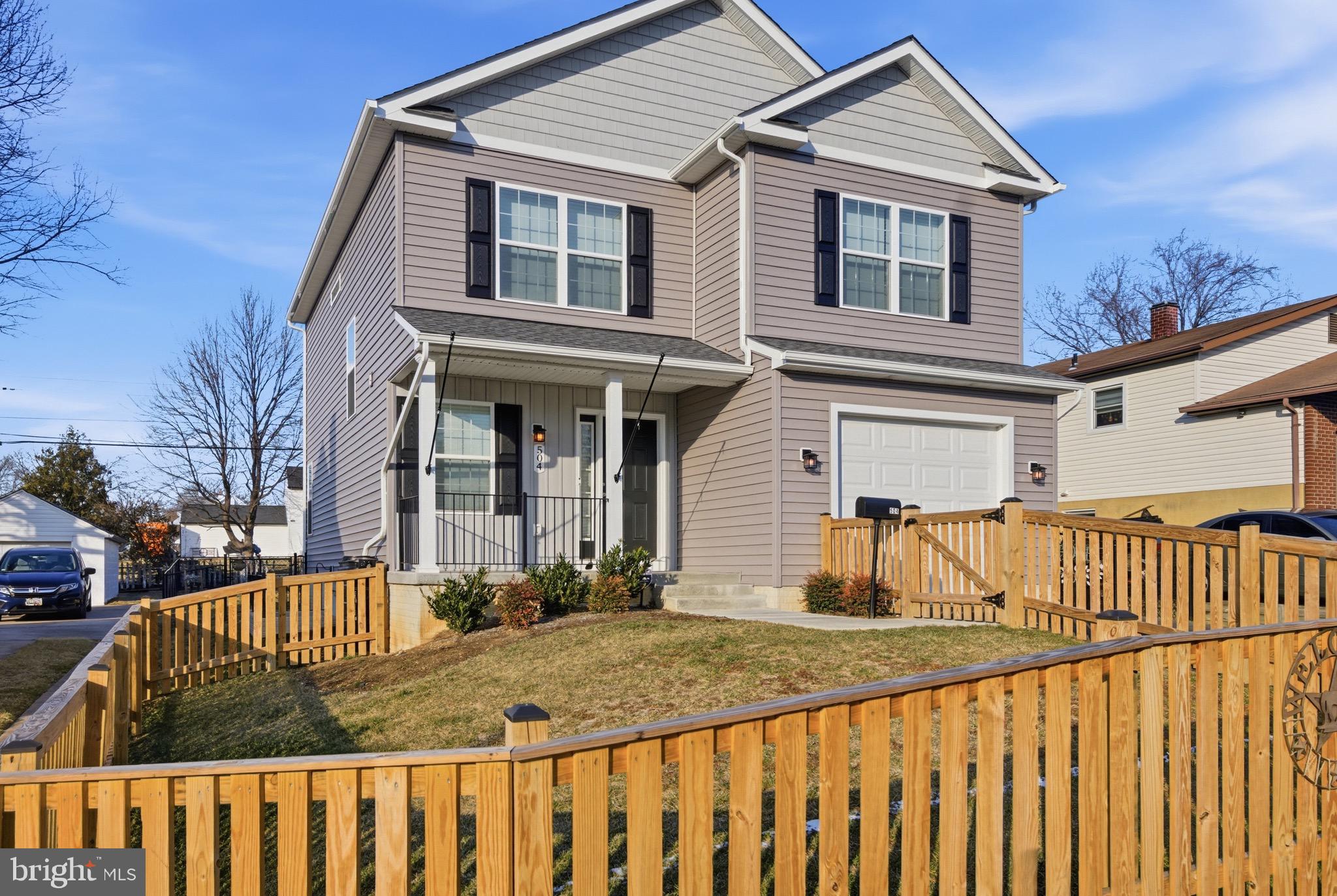 504 Cleveland Road Linthicum Heights, MD 21090 - Photo 2 of 54 a view of a house with wooden fence