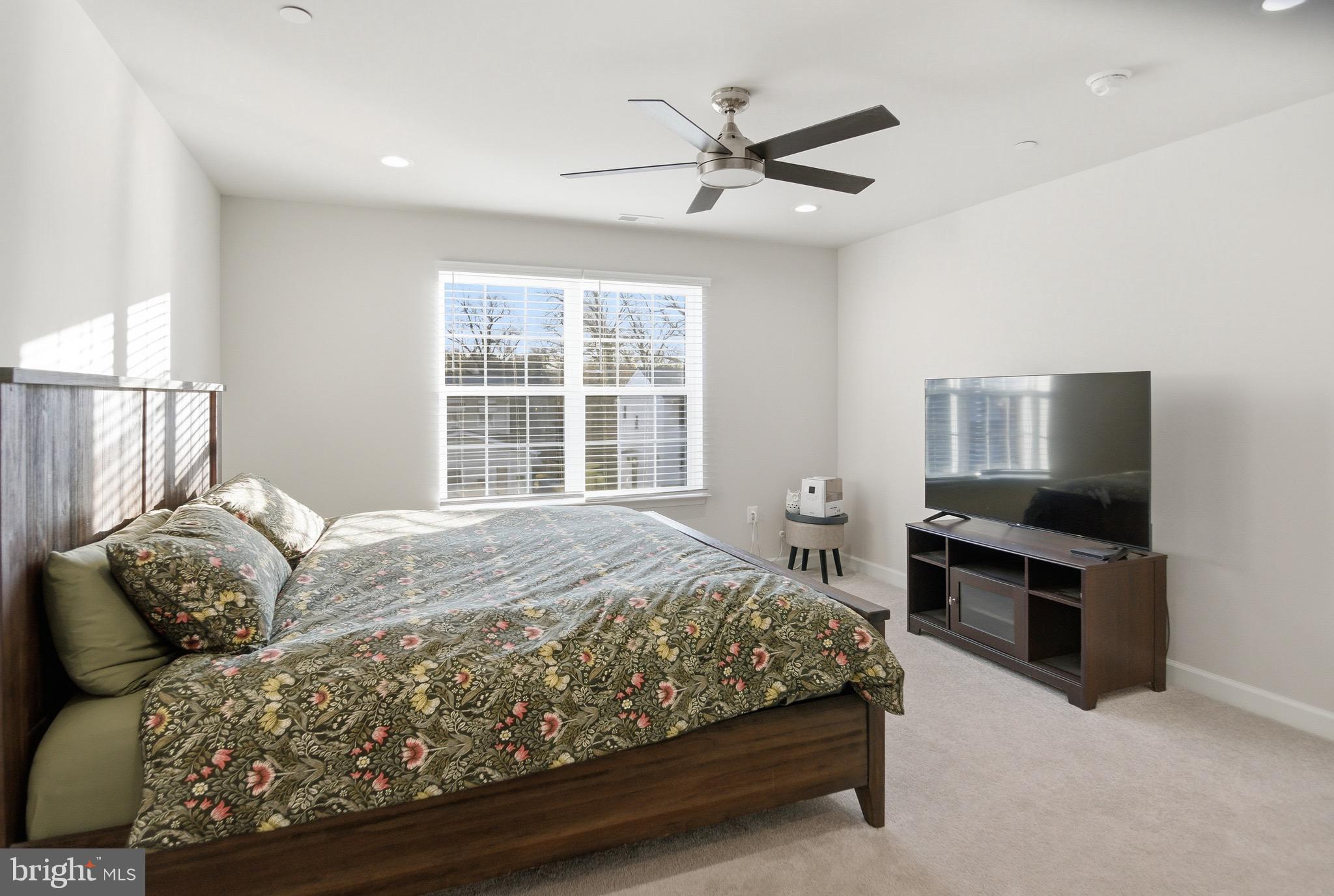 504 Cleveland Road Linthicum Heights, MD 21090 - Photo 21 of 54 a bedroom with a bed couch and window
