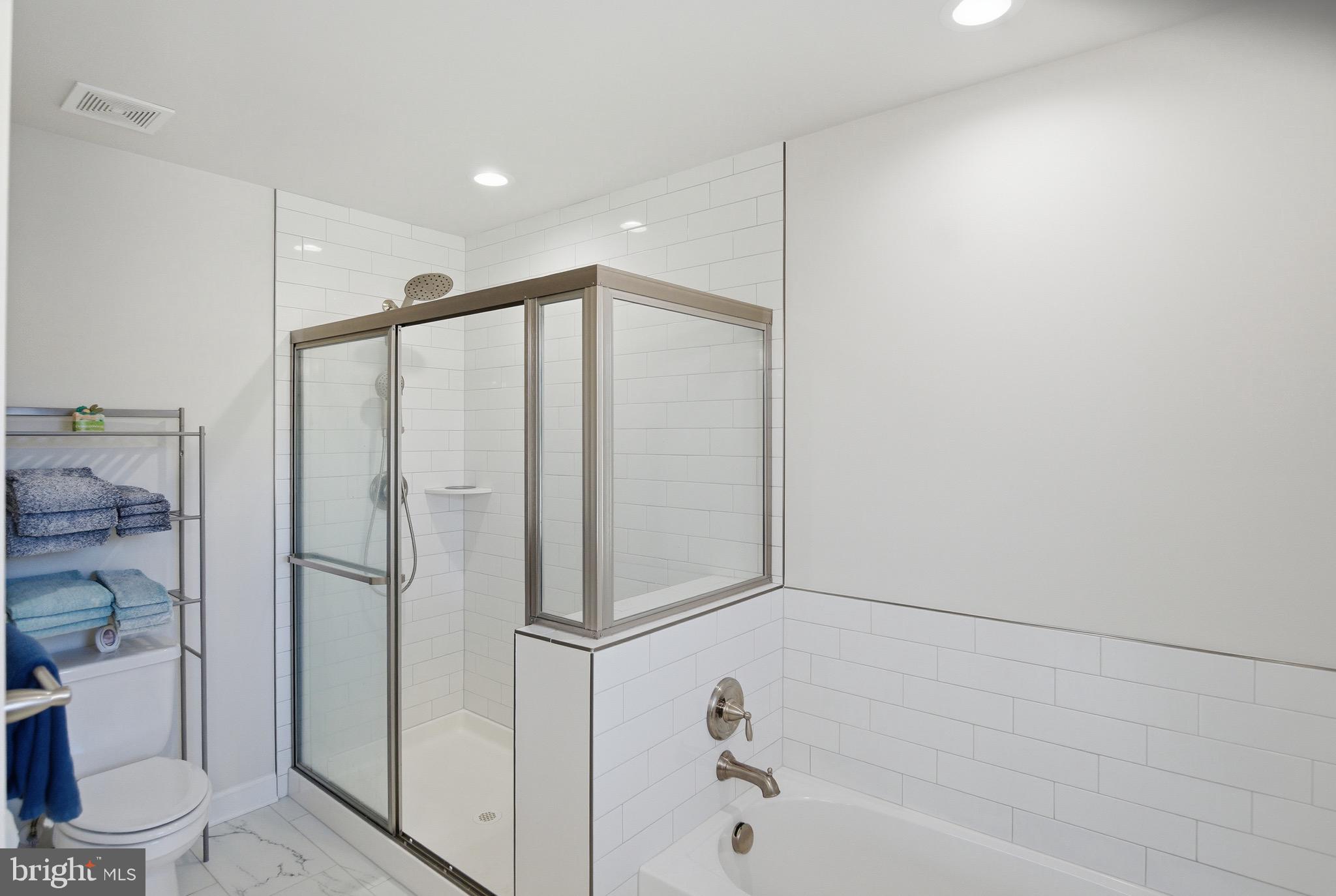 504 Cleveland Road Linthicum Heights, MD 21090 - Photo 27 of 54 a bathroom with a shower and a toilet
