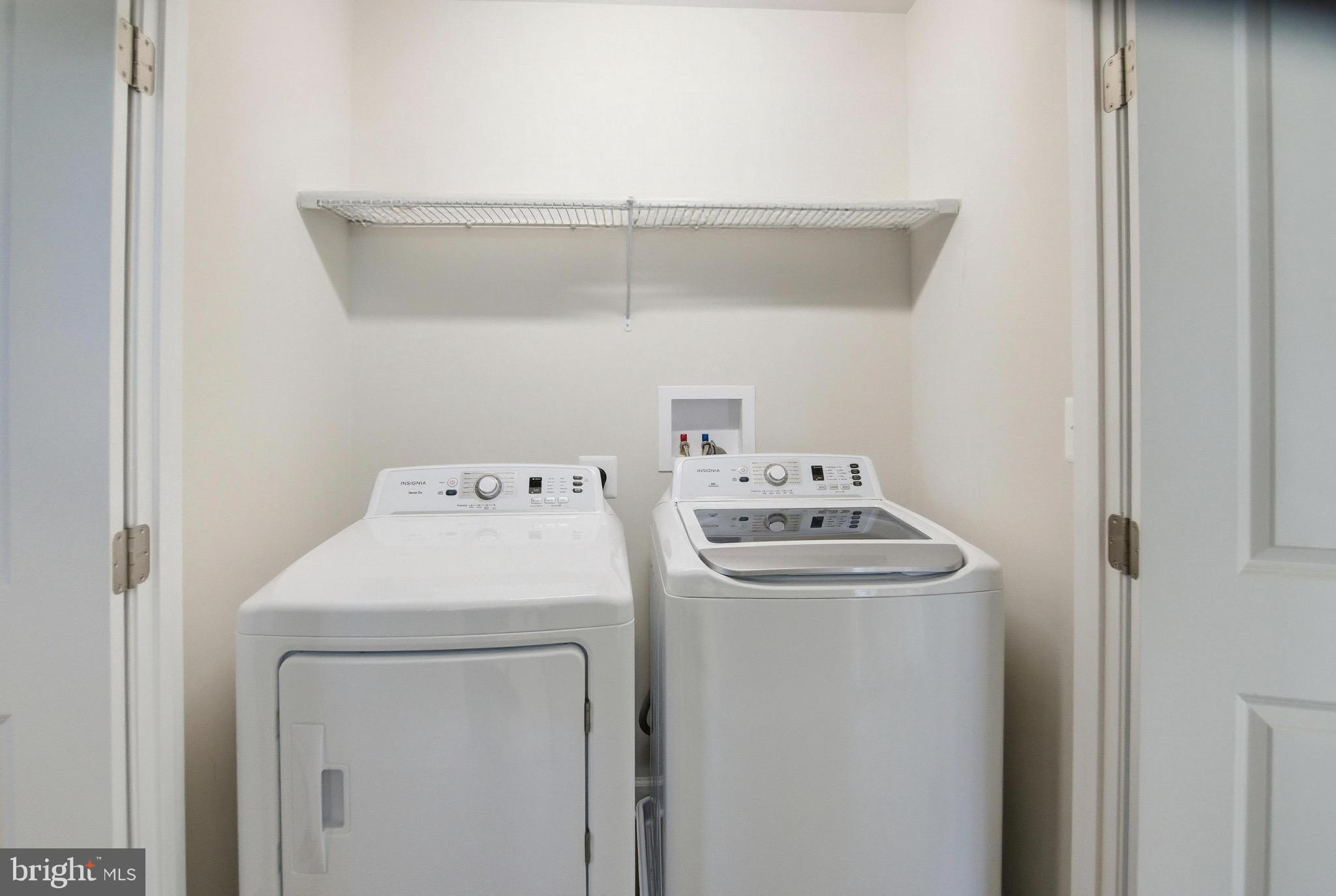504 Cleveland Road Linthicum Heights, MD 21090 - Photo 31 of 54 a utility room with dryer and washer
