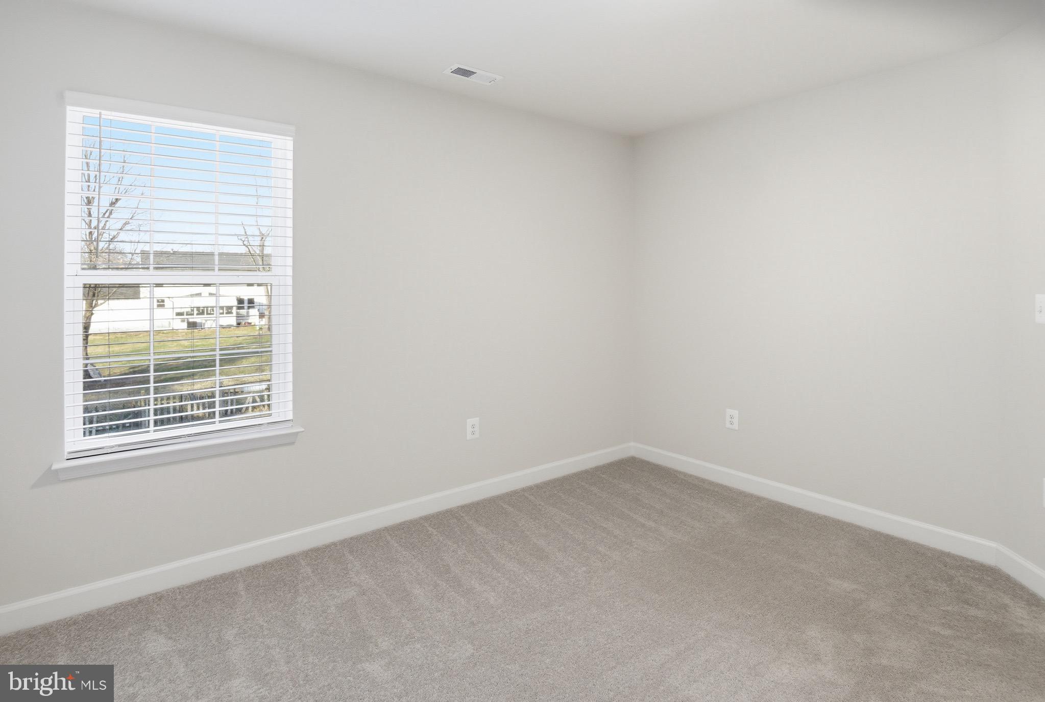 504 Cleveland Road Linthicum Heights, MD 21090 - Photo 33 of 54 an empty room with a window