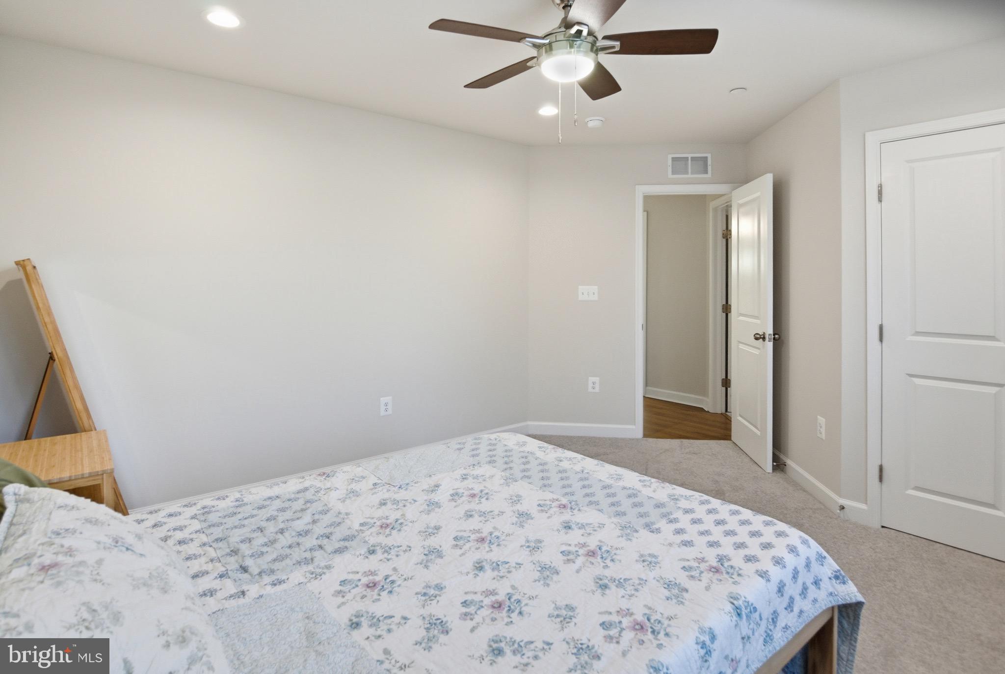 504 Cleveland Road Linthicum Heights, MD 21090 - Photo 35 of 54 a bedroom with a bed and a window