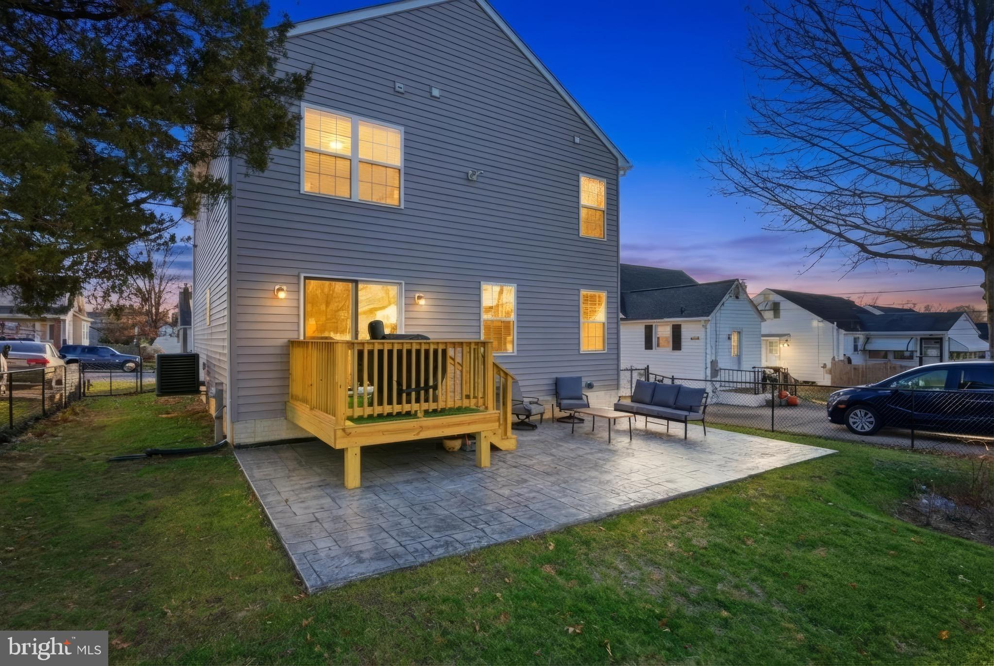 504 Cleveland Road Linthicum Heights, MD 21090 - Photo 52 of 54 a view of a house with a yard porch and sitting area