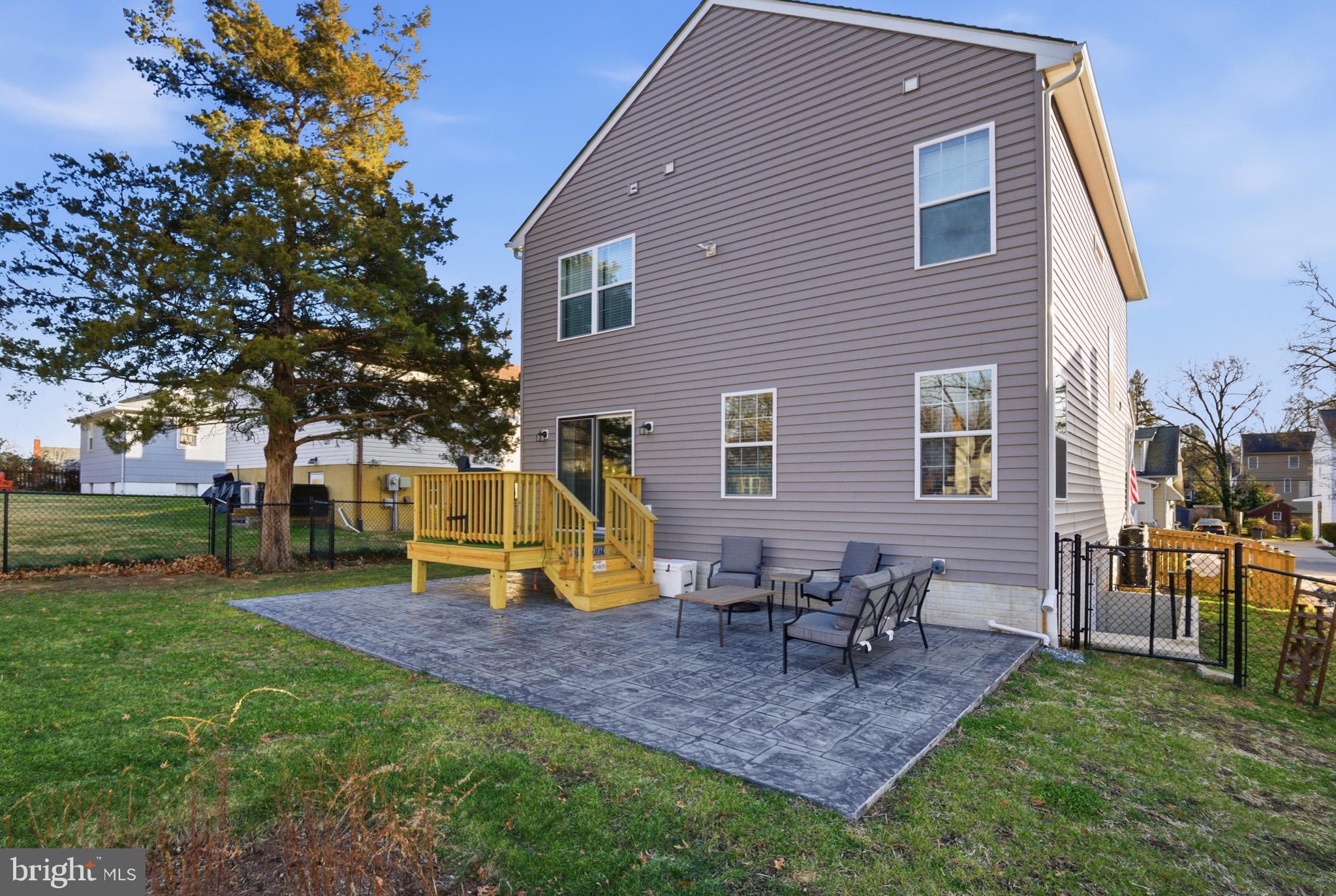 504 Cleveland Road Linthicum Heights, MD 21090 - Photo 6 of 54 a view of a house with backyard porch and sitting area