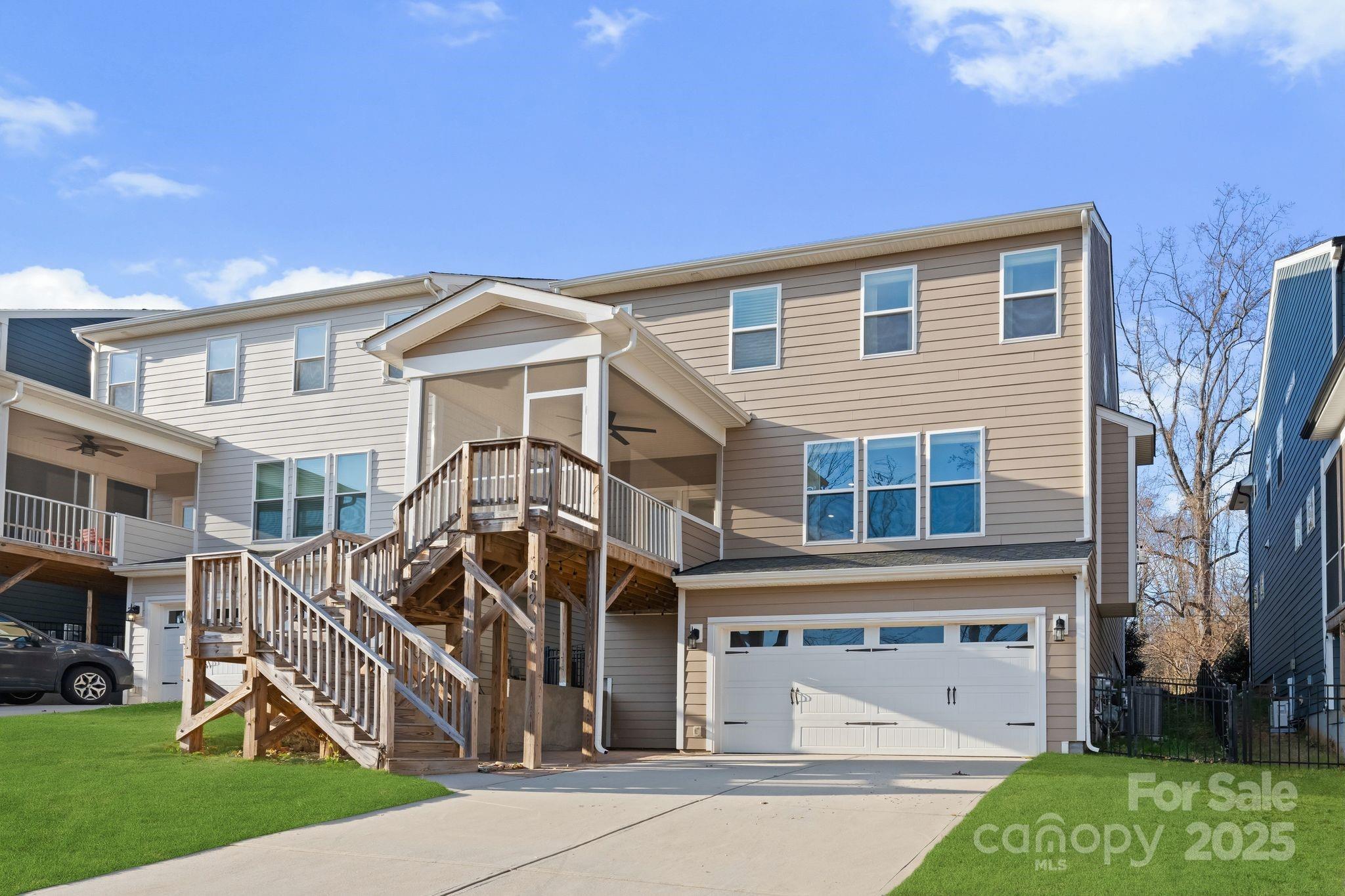 619-r L R L Stowe Road Belmont, NC 28012 - Photo 2 of 33 a front view of a house with a yard