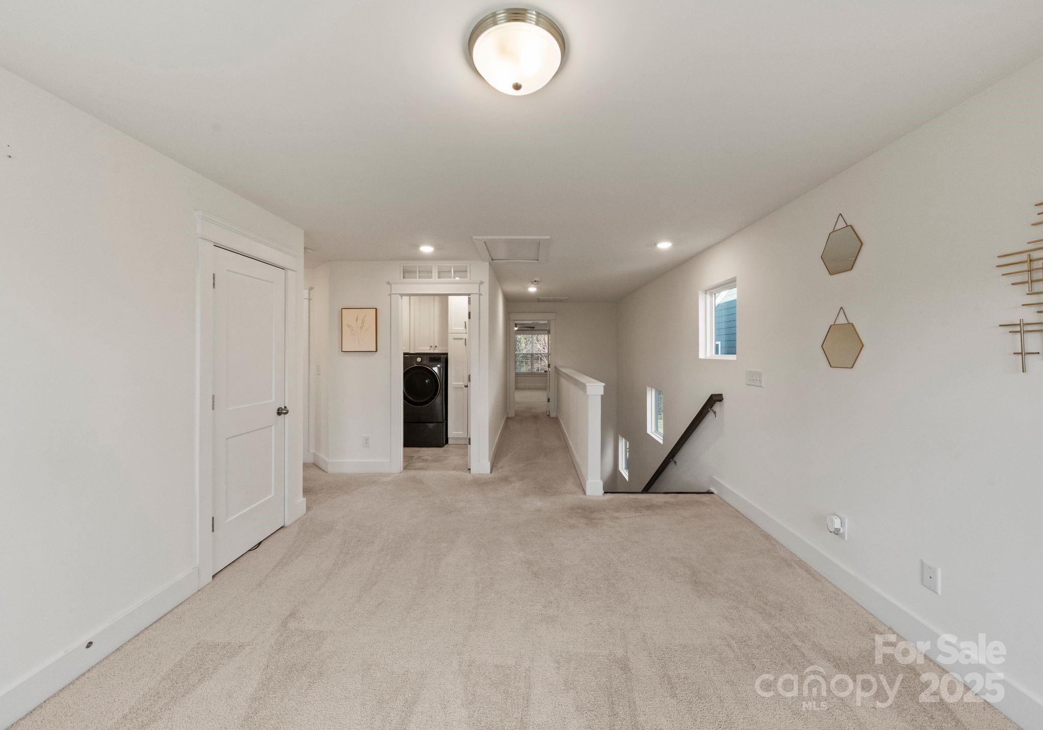 619-r L R L Stowe Road Belmont, NC 28012 - Photo 25 of 33 a view of a livingroom with furniture and a ceiling fan