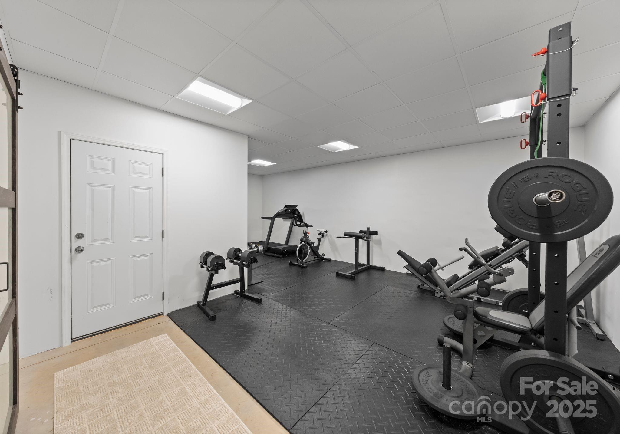 619-r L R L Stowe Road Belmont, NC 28012 - Photo 27 of 33 a view of a livingroom with furniture and a floor to ceiling window