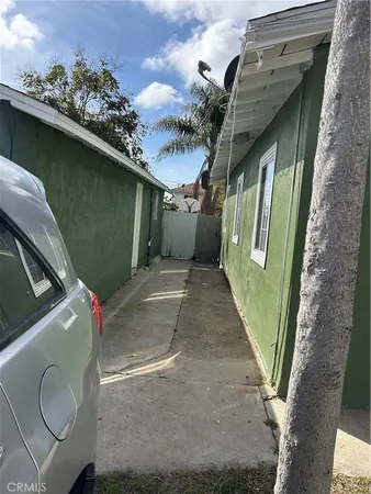 a view of entrance gate of a house