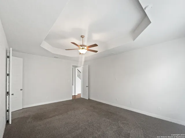a view of a big room with carpet
