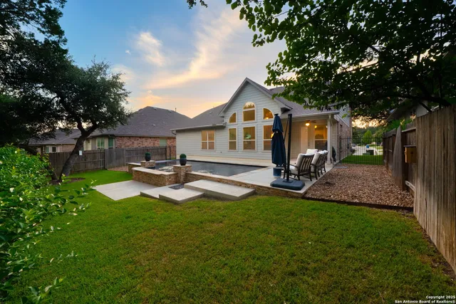 an aerial view of residential house with outdoor space