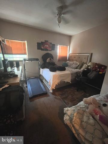 1711 North Pulaski Street Baltimore, MD 21217 - Photo 11 of 14 a living room with furniture and a fireplace