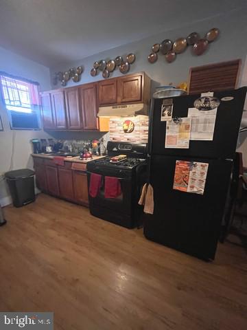 1711 North Pulaski Street Baltimore, MD 21217 - Photo 6 of 14 a kitchen with granite countertop a stove top oven