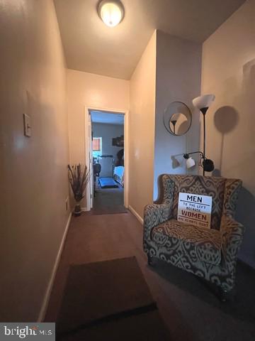 1711 North Pulaski Street Baltimore, MD 21217 - Photo 10 of 14 a living room with furniture and a rug