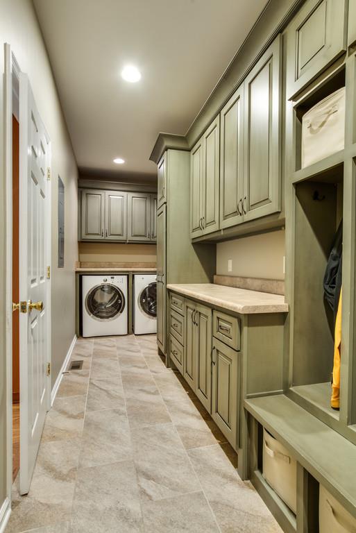 508 Rafe Court Franklin, TN 37064 - Photo 12 of 30 a kitchen with stainless steel appliances a stove a sink and a microwave