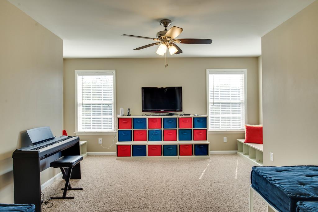 508 Rafe Court Franklin, TN 37064 - Photo 16 of 30 a living room with furniture and a flat screen tv