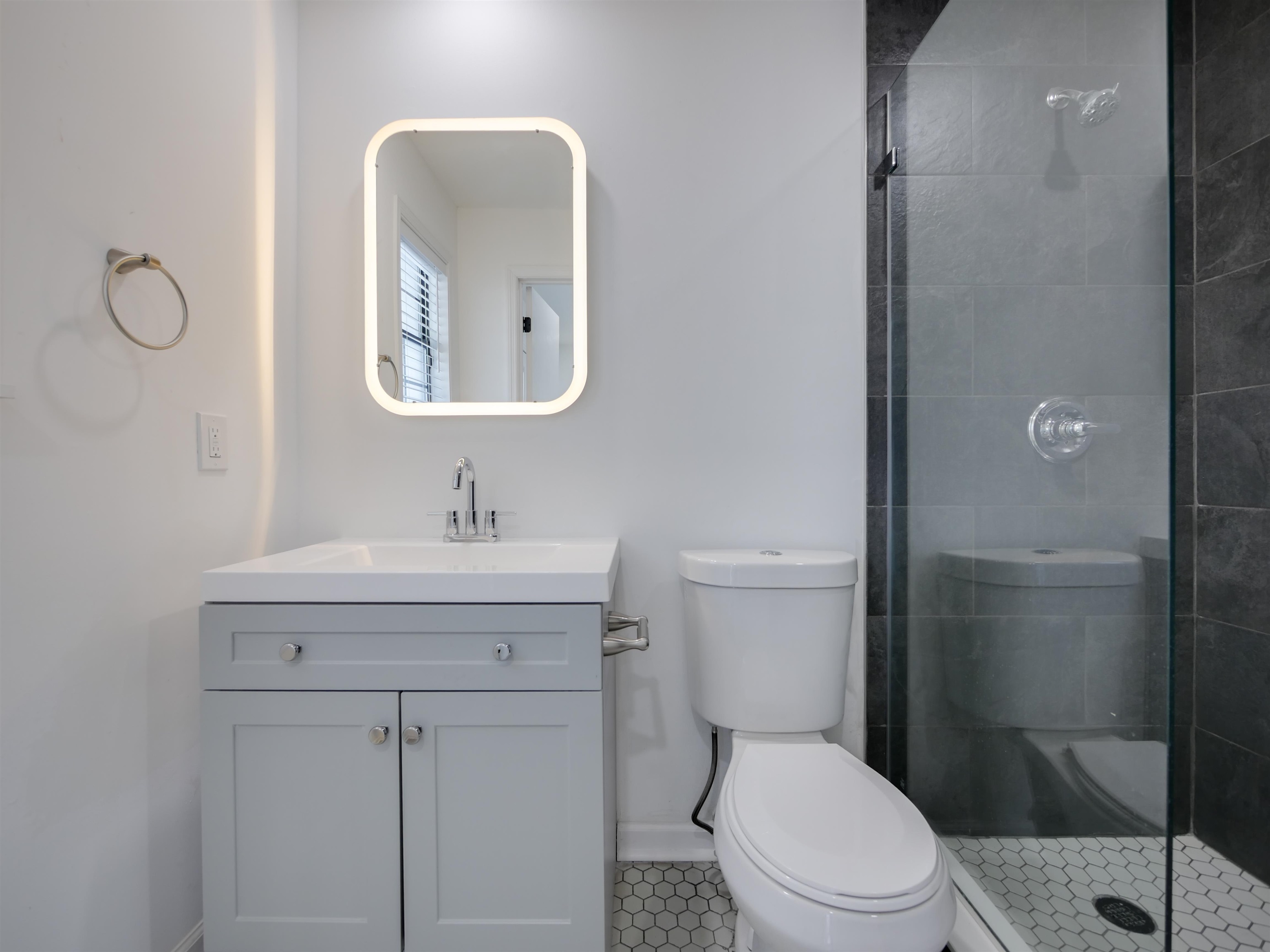 136 Bonita Road St. Augustine, FL 32086 - Photo 17 of 26 a bathroom with a toilet a sink and mirror