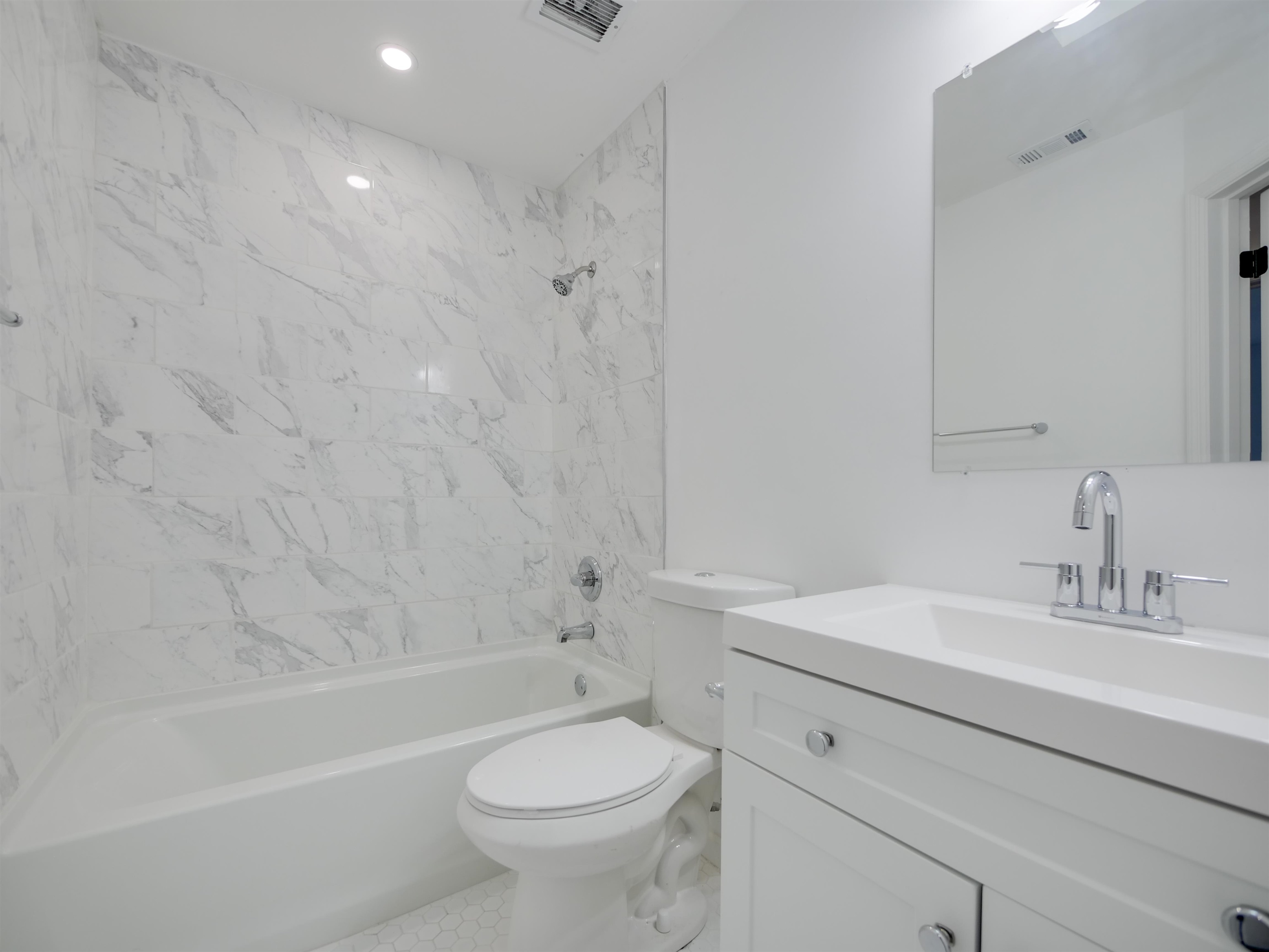136 Bonita Road St. Augustine, FL 32086 - Photo 20 of 26 a bathroom with a sink a toilet and a bathtub