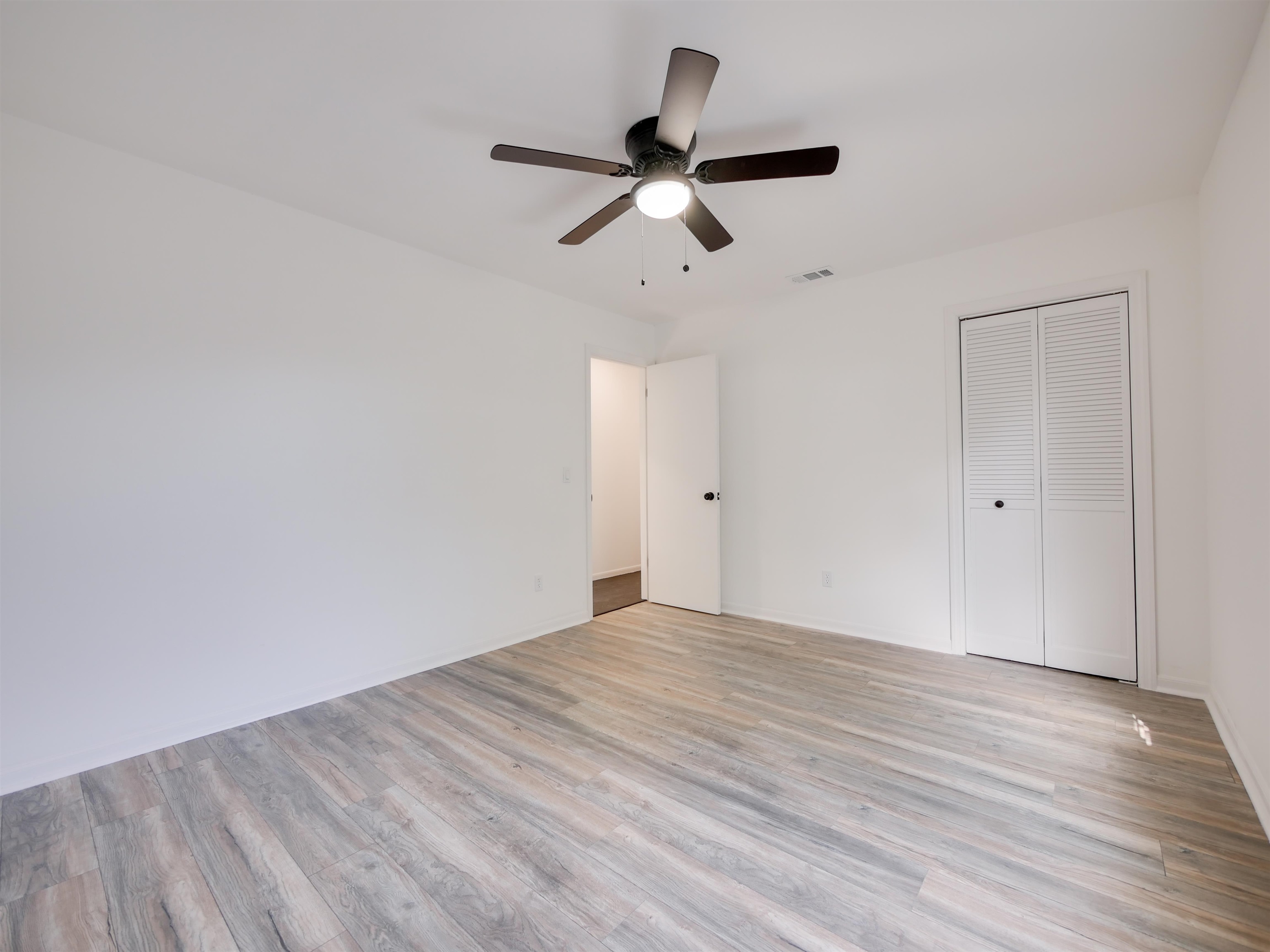 136 Bonita Road St. Augustine, FL 32086 - Photo 23 of 26 a view of empty room with wooden floor