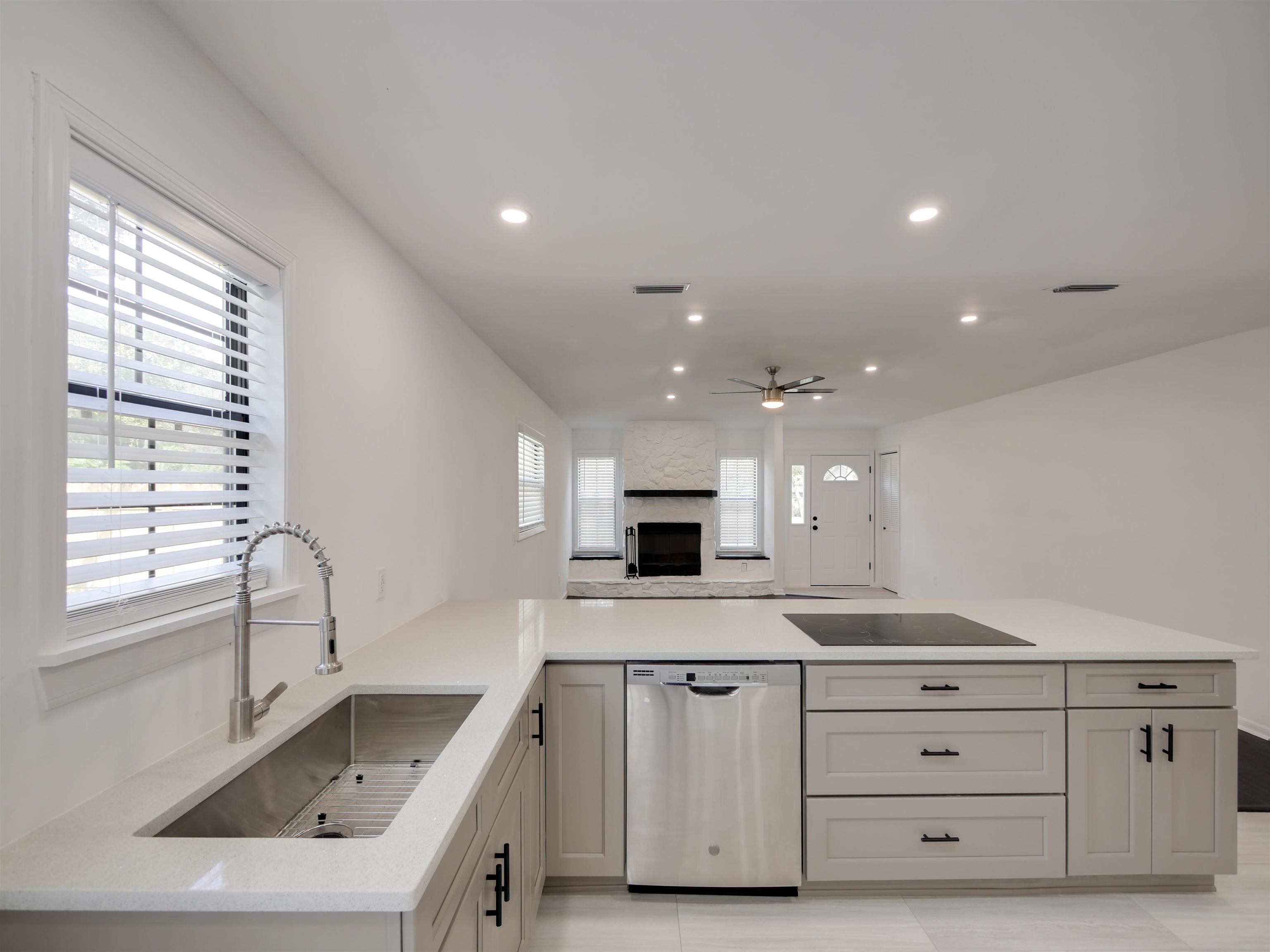 136 Bonita Road St. Augustine, FL 32086 - Photo 6 of 26 a kitchen with a sink stove and cabinets