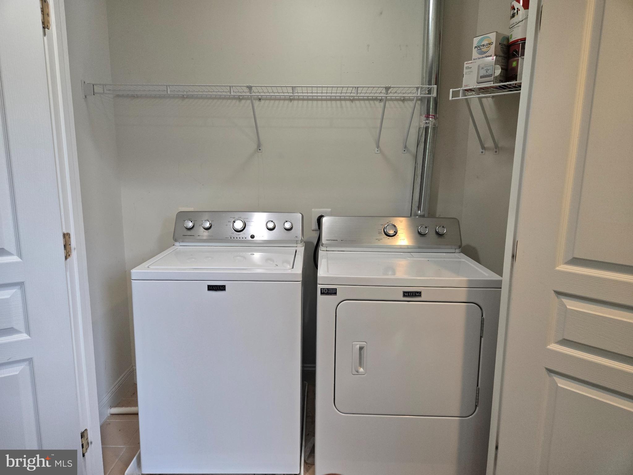 6444 5th Street Alexandria, VA 22312 - Photo 19 of 34 Modern laundry space with sleek appliances.