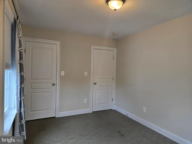 a bathroom with a sink and toilet