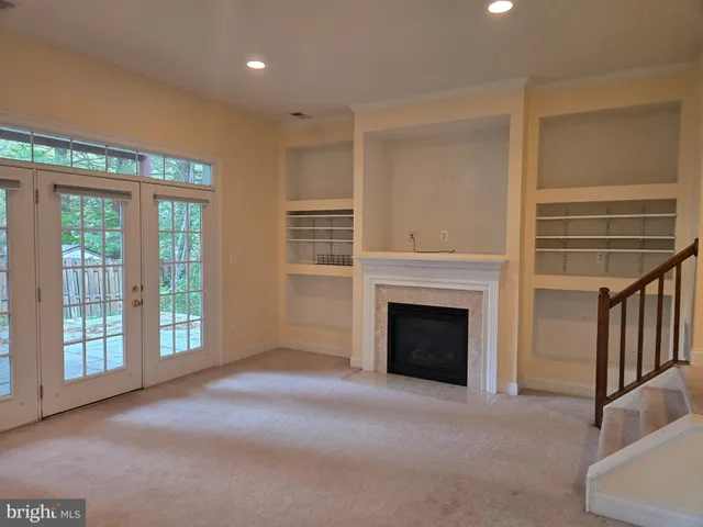 a view of a pathway with a garden