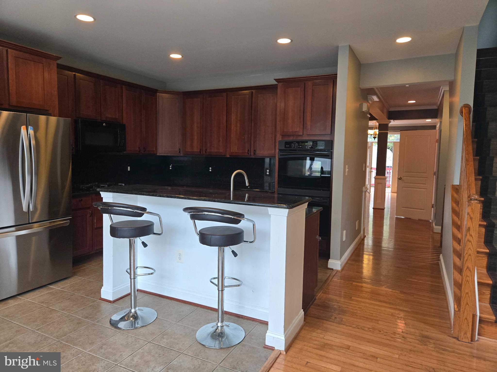 6444 5th Street Alexandria, VA 22312 - Photo 4 of 34 Modern kitchen with sleek finishes.