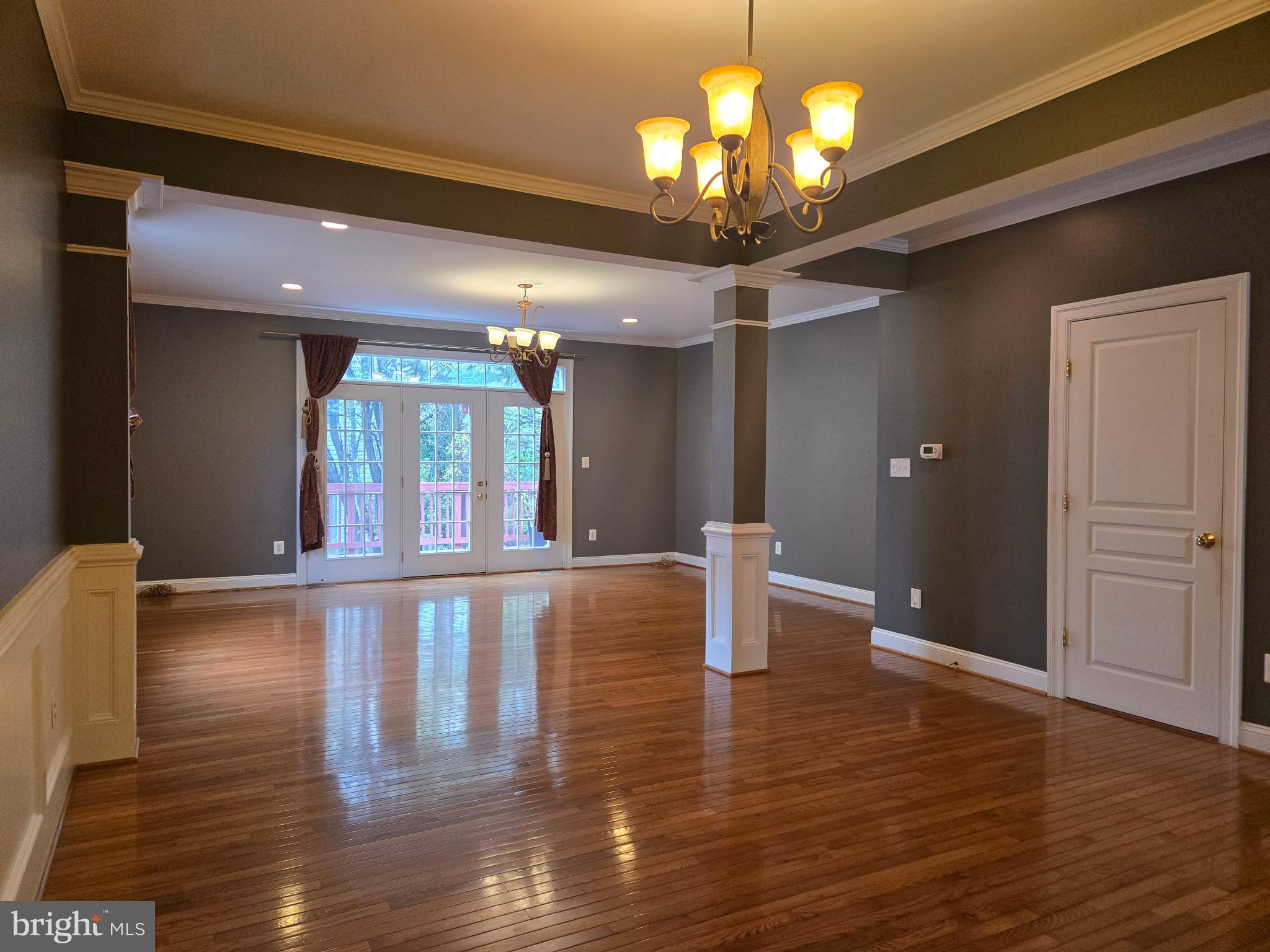 6444 5th Street Alexandria, VA 22312 - Photo 7 of 34 Spacious room with elegant lighting and views.