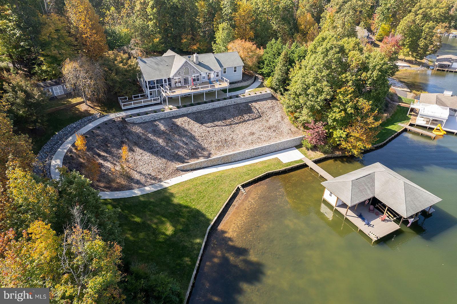 1069 Mitchell Point Road Mineral, VA 23117 - Photo 11 of 77 Concrete path to boathouse from garage