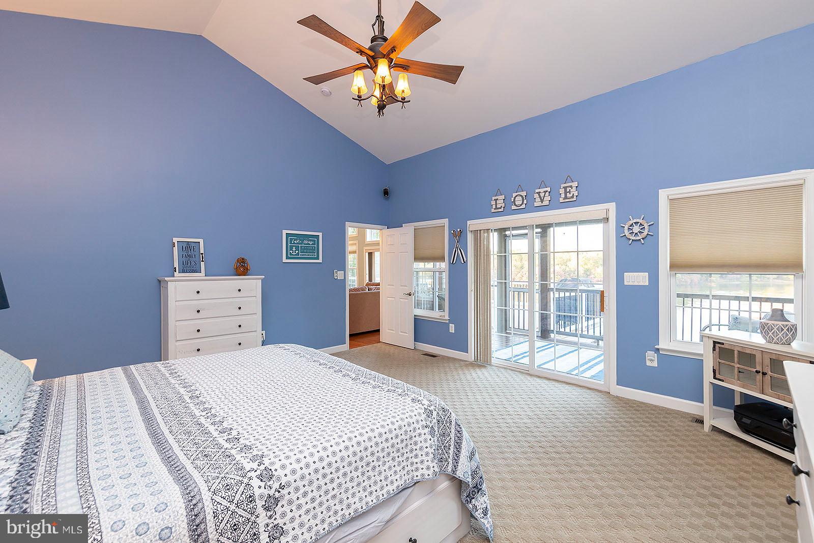 1069 Mitchell Point Road Mineral, VA 23117 - Photo 32 of 77 Primary bedroom w/ access to screened porch