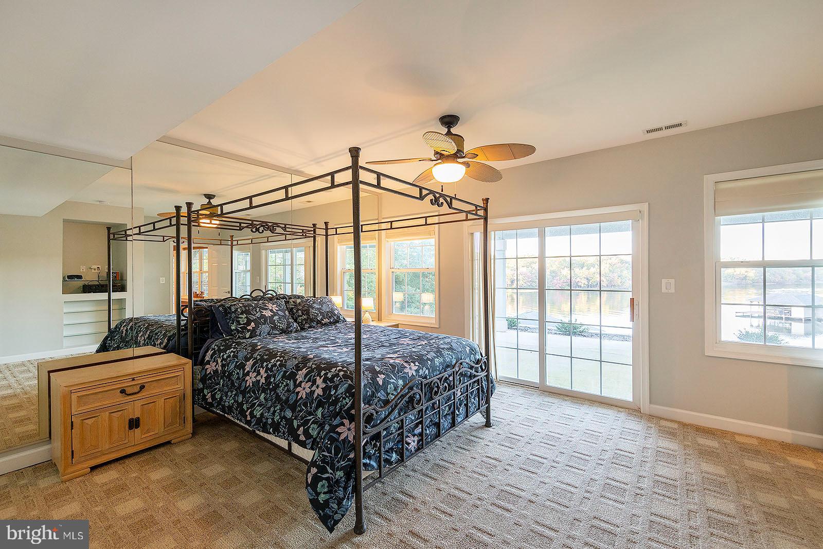 1069 Mitchell Point Road Mineral, VA 23117 - Photo 49 of 77 Lower level bedroom w/ lake views & patio access