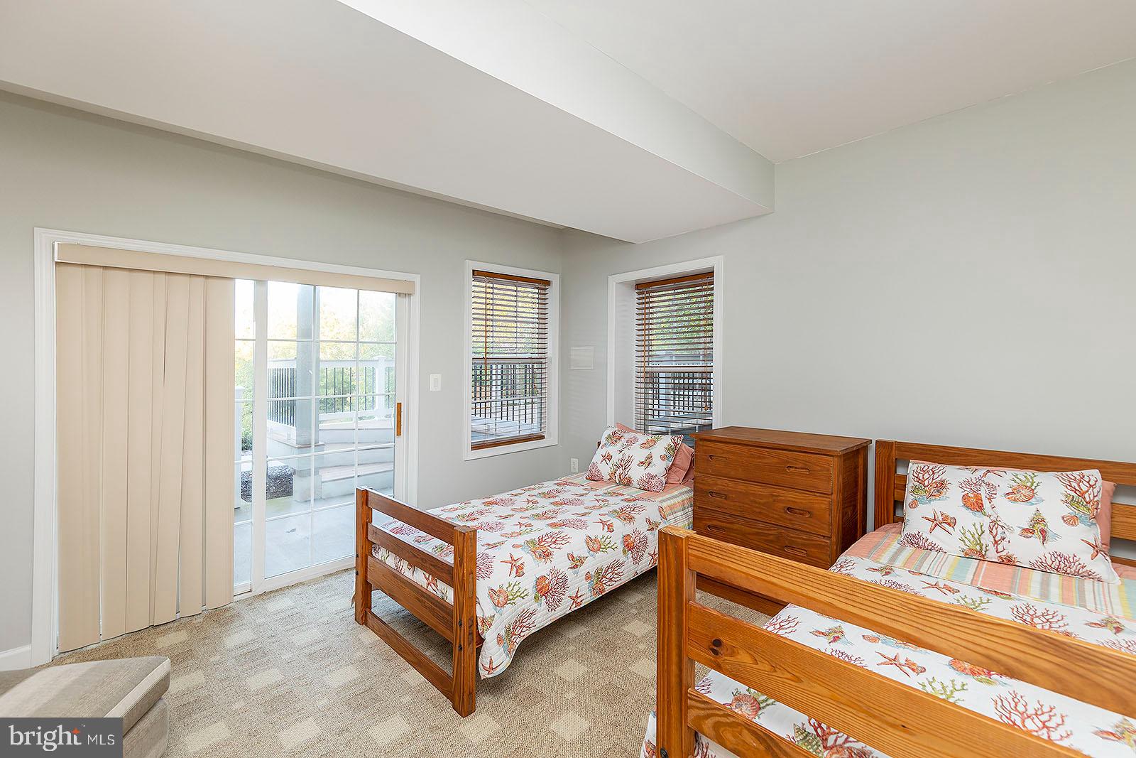 1069 Mitchell Point Road Mineral, VA 23117 - Photo 53 of 77 Lower level bedroom w/ lake views & patio access