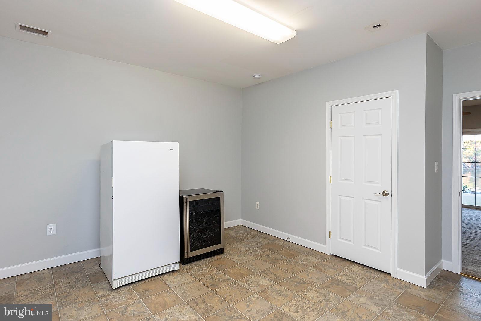 1069 Mitchell Point Road Mineral, VA 23117 - Photo 56 of 77 Bonus room on lower level w/ freezer & wine cooler