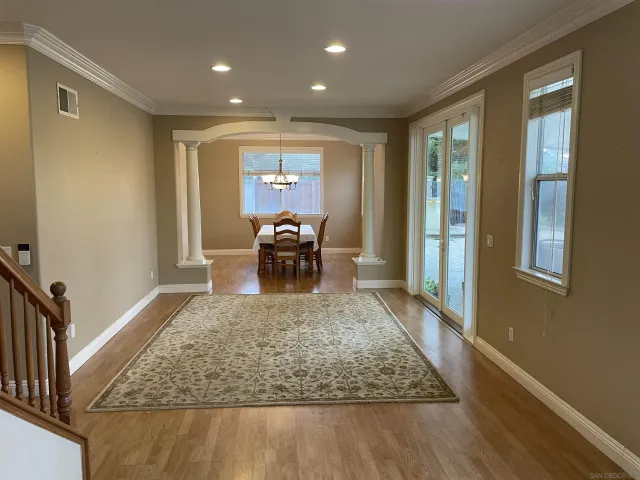 a view of living room filled with furniture